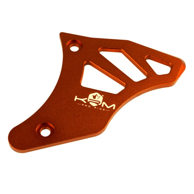 Pokrywa zębatki zdawczej KRM Pro Ride pomarańczowa aluminium CNC Derbi D50B0 / EBS050 — ujęcie 1